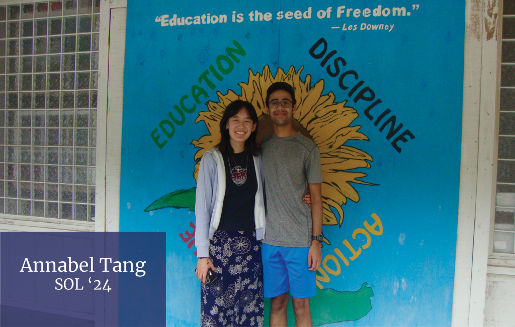 Annabel Tang and another person are posing in front of a mural. Bottom left corner says "Annabel Tang, SOL '24"